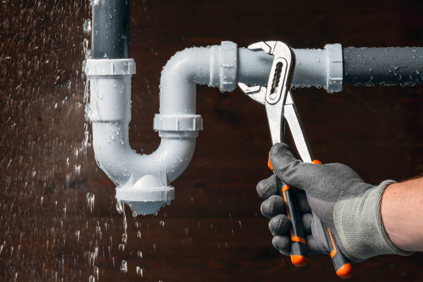 Professional Plumbing technician working in Menomonee Falls, WI